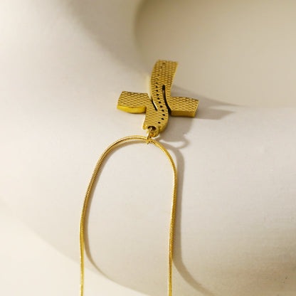 ARCASSA: Zirconia Embedded Hammered Finish Cross Pendant on a Mini Snake Skin Textured Chain Necklace.